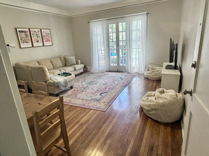 Open living and dining room with hardwood floors